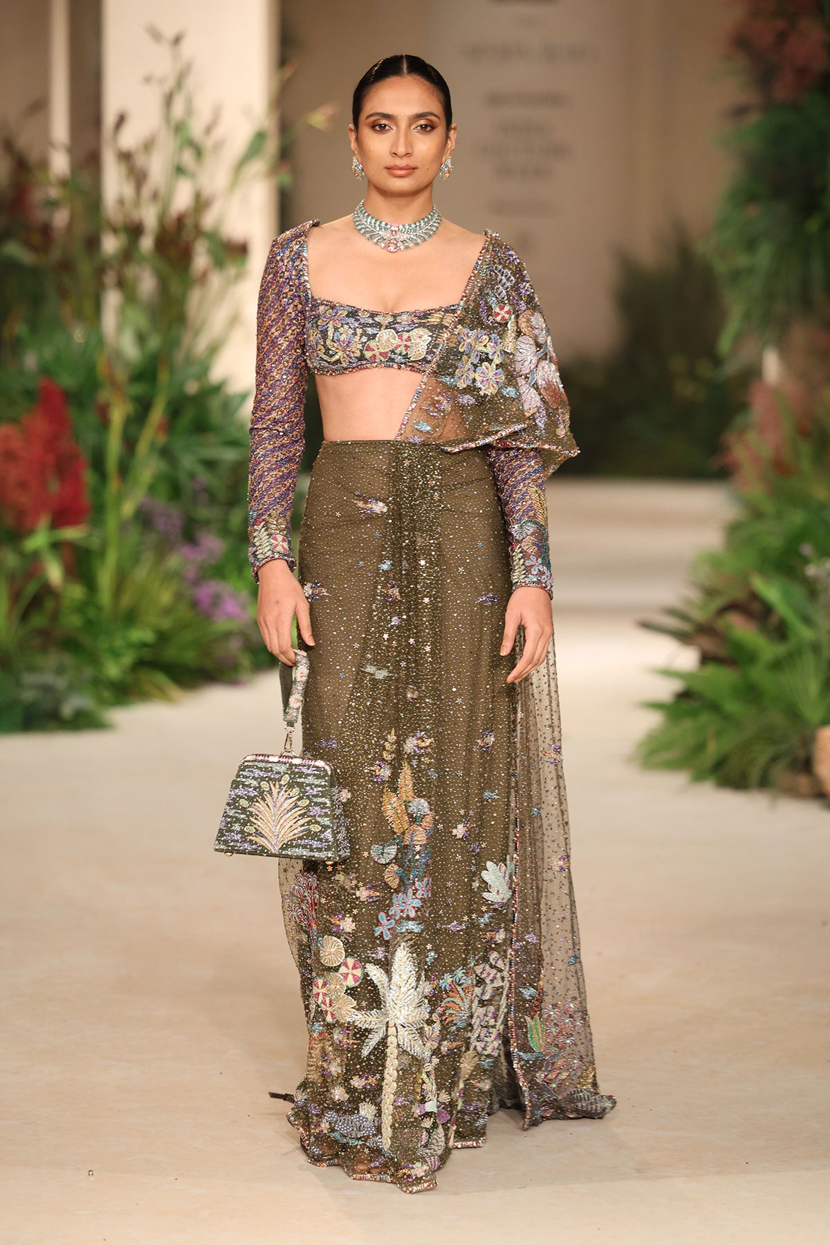 Bloomveil - Lush green gunmetal shimmer net drape saree