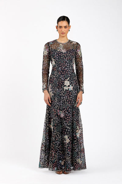 Woman wearing Matilda black tulle applique embellished gown