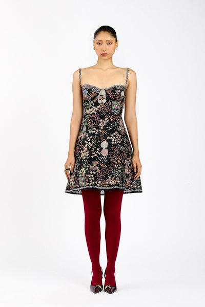 Woman wearing Matilda black tulle baby doll dress
