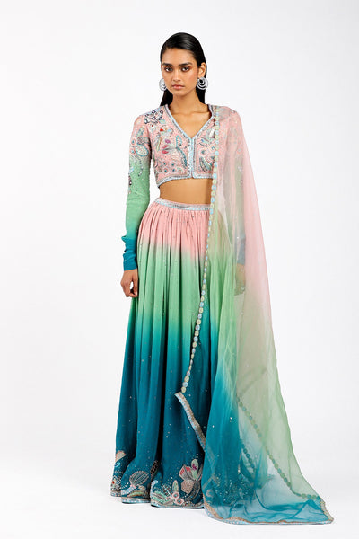 Woman wearing Kinfolk Aurora Ombre embellished crepe lehenga