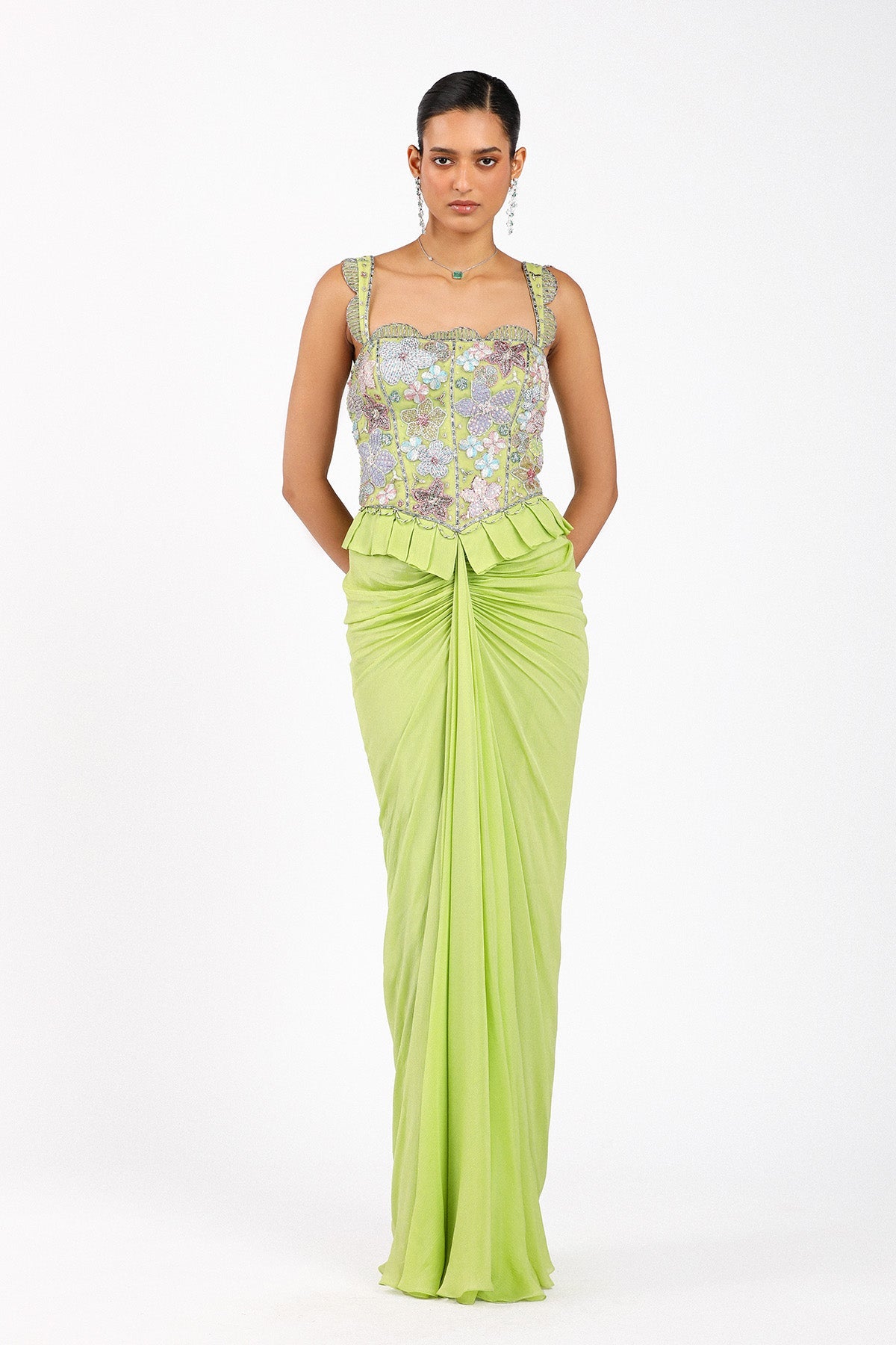 Woman wearing Matilda lime green chiffon ruched gown