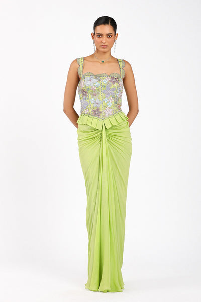 Woman wearing Matilda lime green chiffon ruched gown