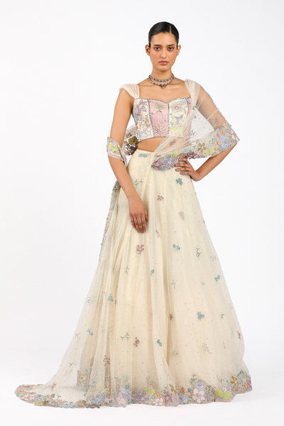 Woman wearing Matilda ivory stitched saree lehenga set