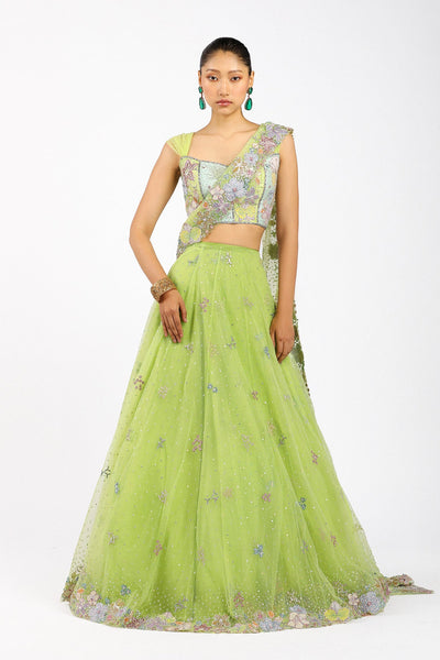 Woman wearing Matilda lime green stitched saree lehenga
