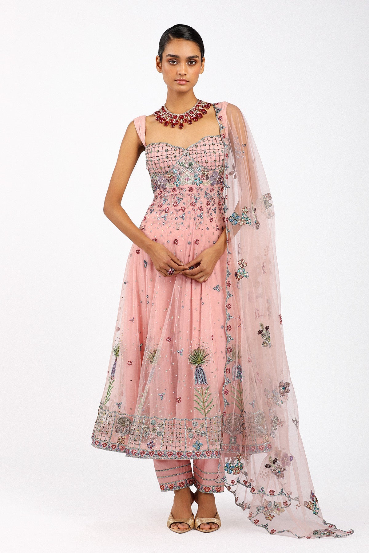 Woman wearing Matilda baby pink tulle net anarkali set