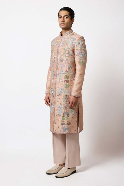 Man wearing Aisha Rao champagne raw silk sherwani front view