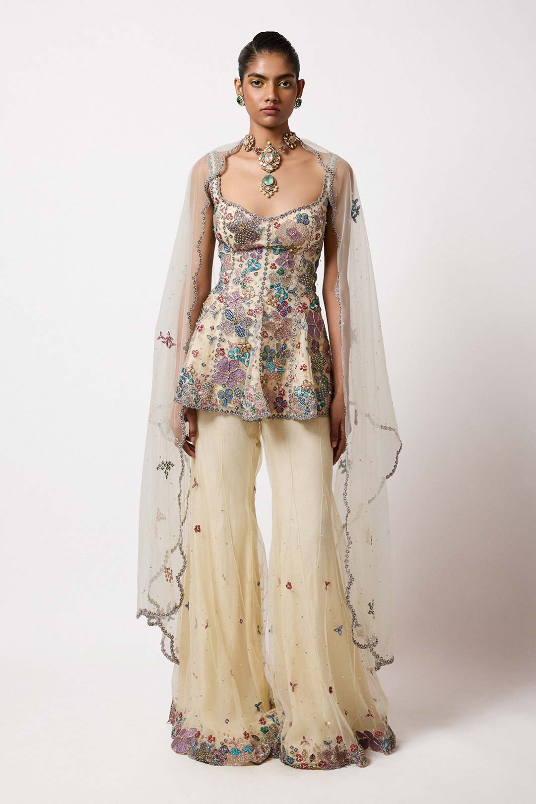 Woman wearing Aisha Rao Matilda Ivory Applique Embellished Net Short Panelled Kurta