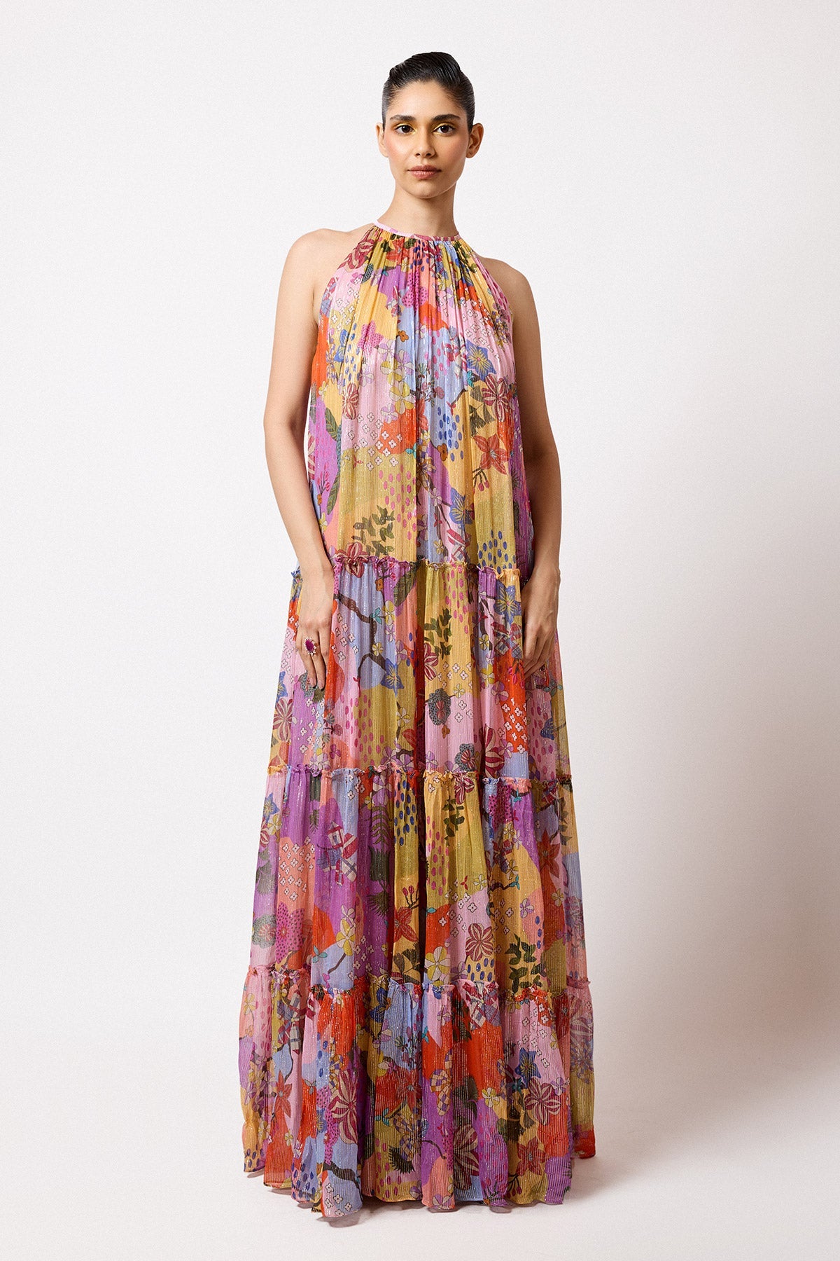 Woman wearing Aisha Rao Matilda Multicolour Printed Lurex Haulter Gathered Gown.
