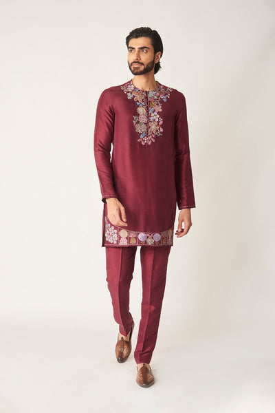 Man wearing plum dupion silk kurta set