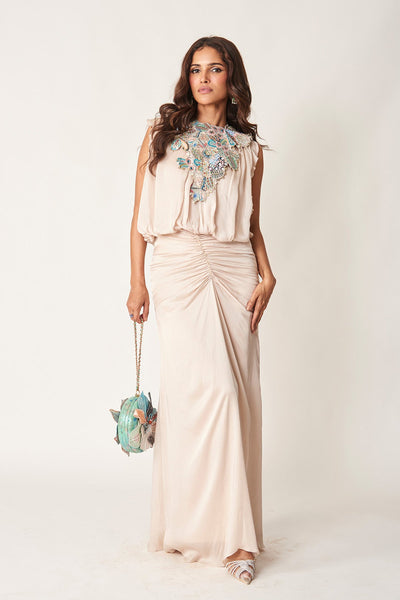 Woman in champagne silky satin applique gown