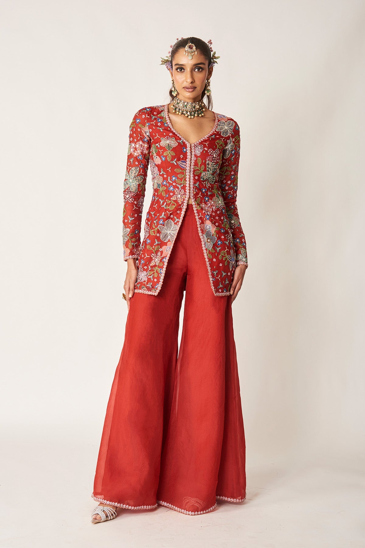 Woman in red organza embellished kurta set