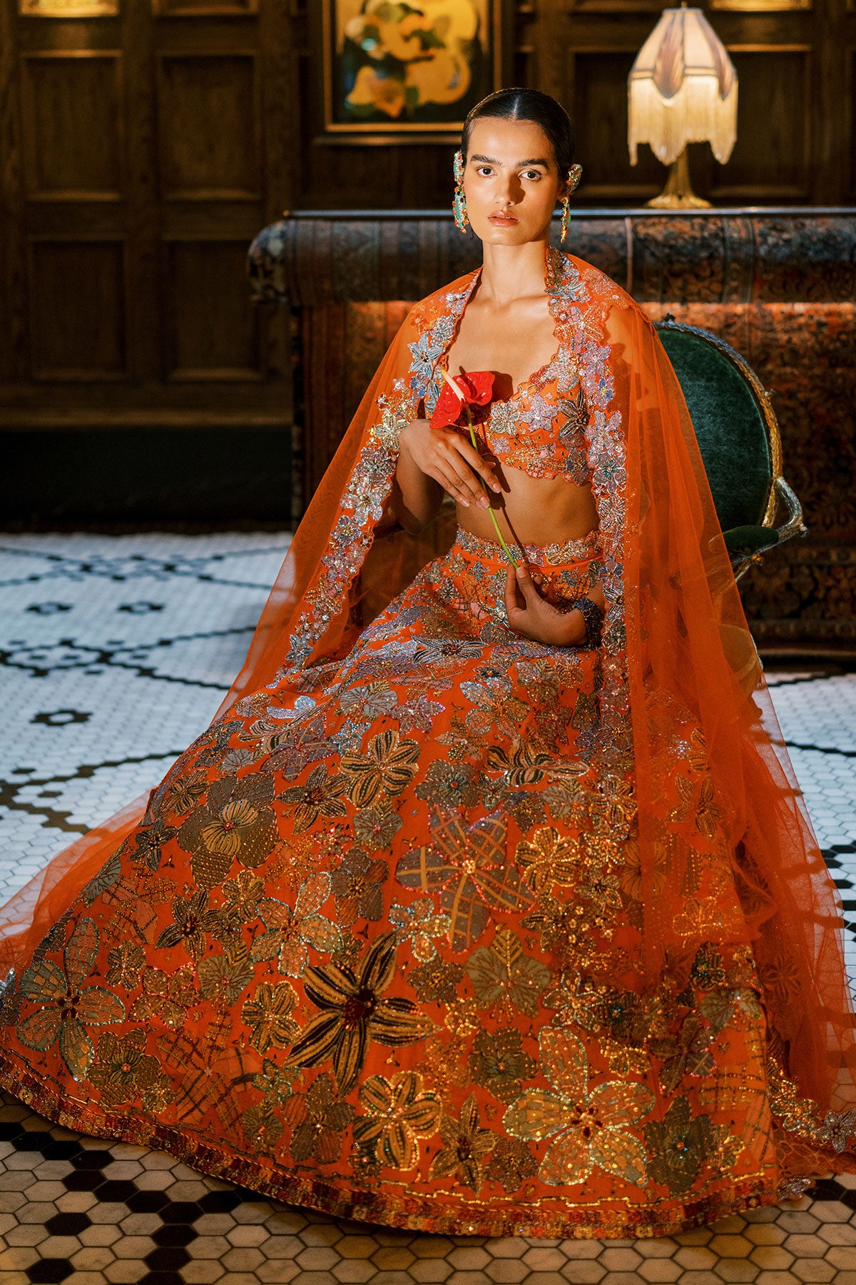Aisha Rao orange lehenga side view with trailing dupatta