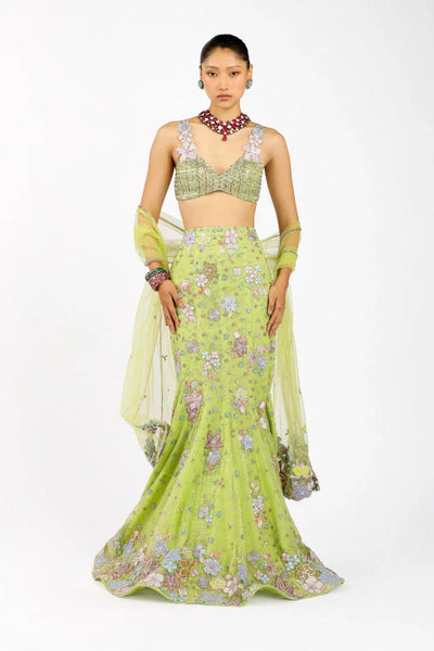 Woman wearing Matilda lime green mermaid lehenga set