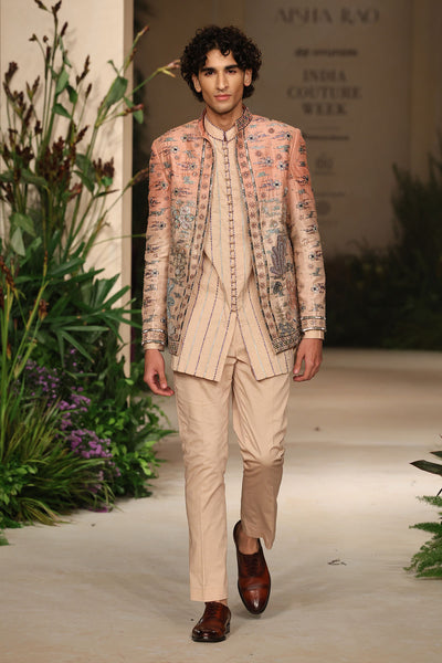 Wild At Heart cantaloupe sandstone jacket set captured in motion showing raw silk fluidity and ombre depth