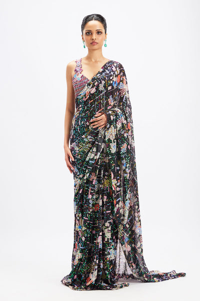 Woman wearing Aisha Rao black-plum saree with bralette blouse