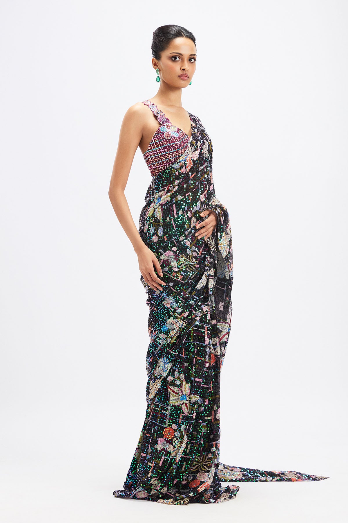 Side profile of Matilda flower blouse and tulle saree by Aisha Rao