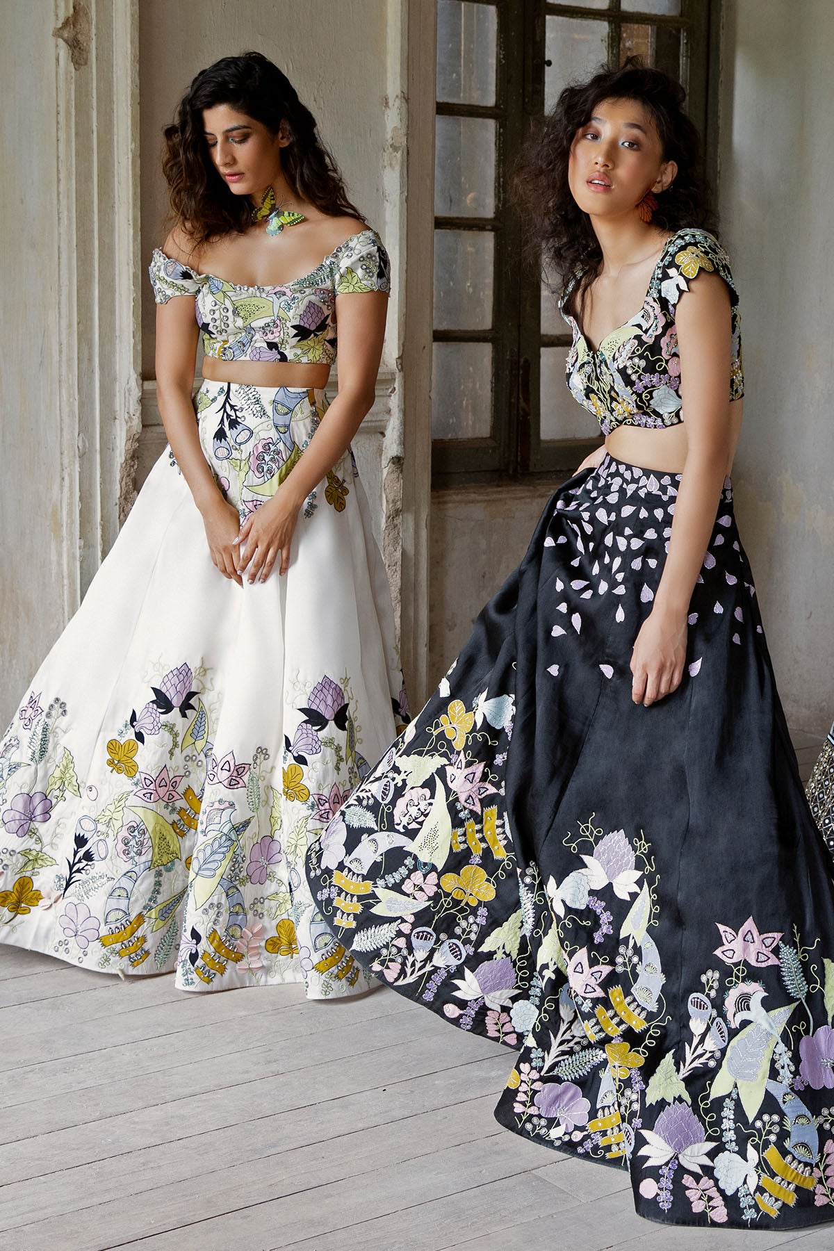 Black tulle dupatta draped over raw silk blouse