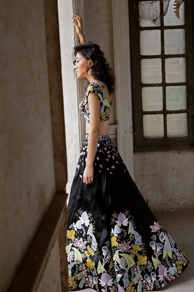 Side angle of black organza lehenga with dupatta