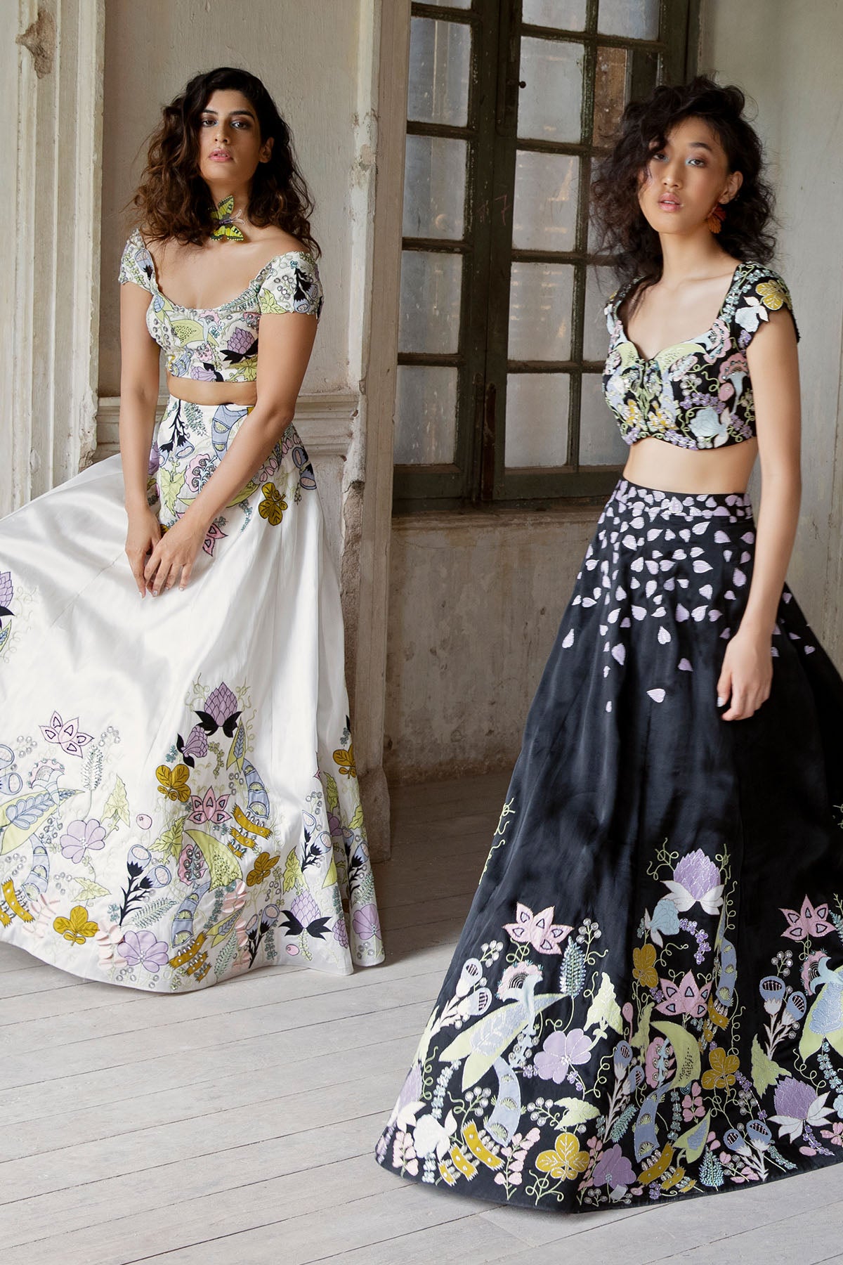 Applique embellished black LK lehenga from left view