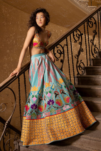 Lehenga and blouse paired with net dupatta