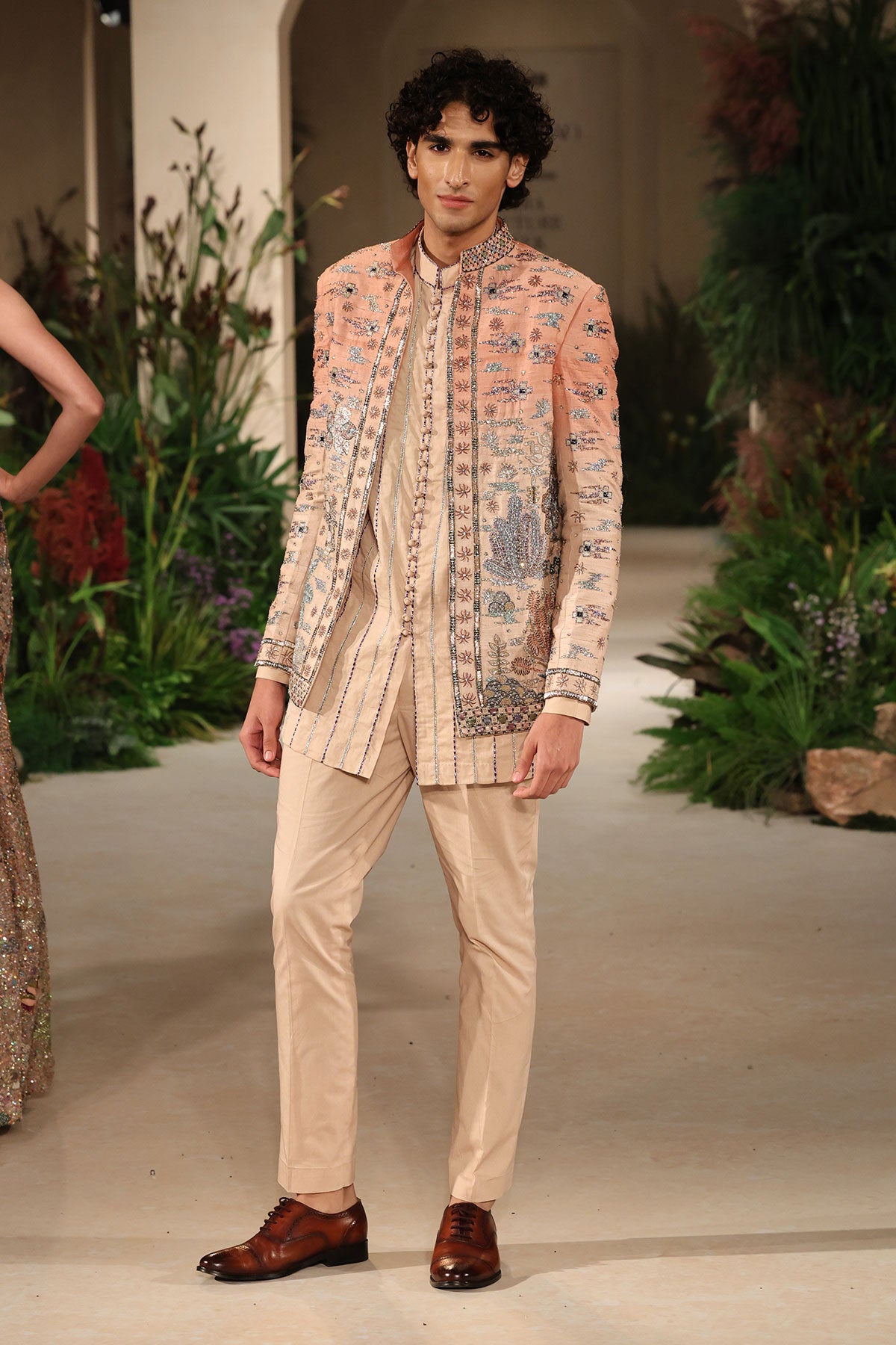 Wild At Heart cantaloupe sandstone jacket set captured in motion showing raw silk fluidity and ombre depth