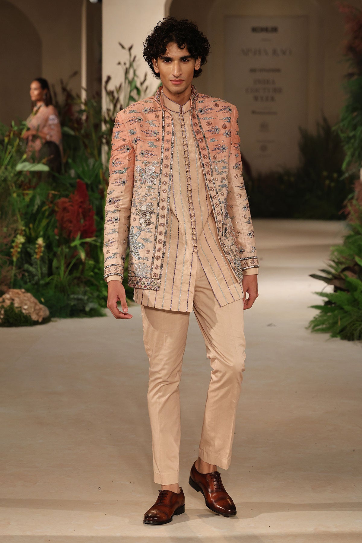 Sleeve detail of the Wild At Heart applique embellished raw silk jacket featuring subtle ombre transitions