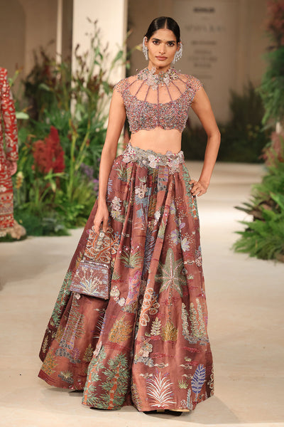 Front view of the tulle beaded 3D flower blouse paired with the Wild At Heart cantaloupe teakberry lehenga