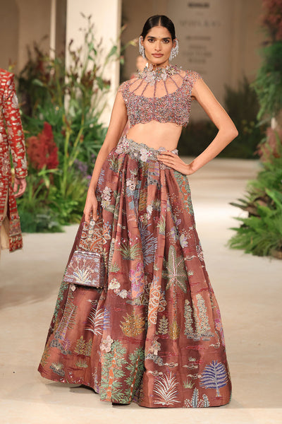 Wild At Heart cantaloupe teakberry printed applique embellished organza box pleat lehenga with tulle beaded 3D flower blouse shown in a full couture view