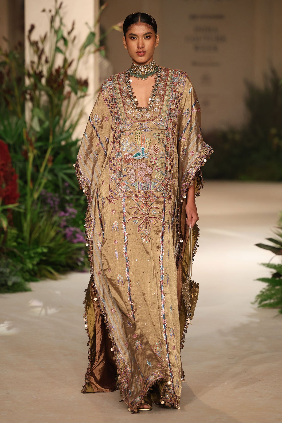 Front view of the Wild At Heart golden banarasi brocade kaftan highlighting applique detailing and luminous texture