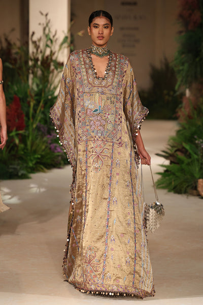 Neckline detail featuring applique artistry and embellished refinement from the Wild At Heart golden kaftan