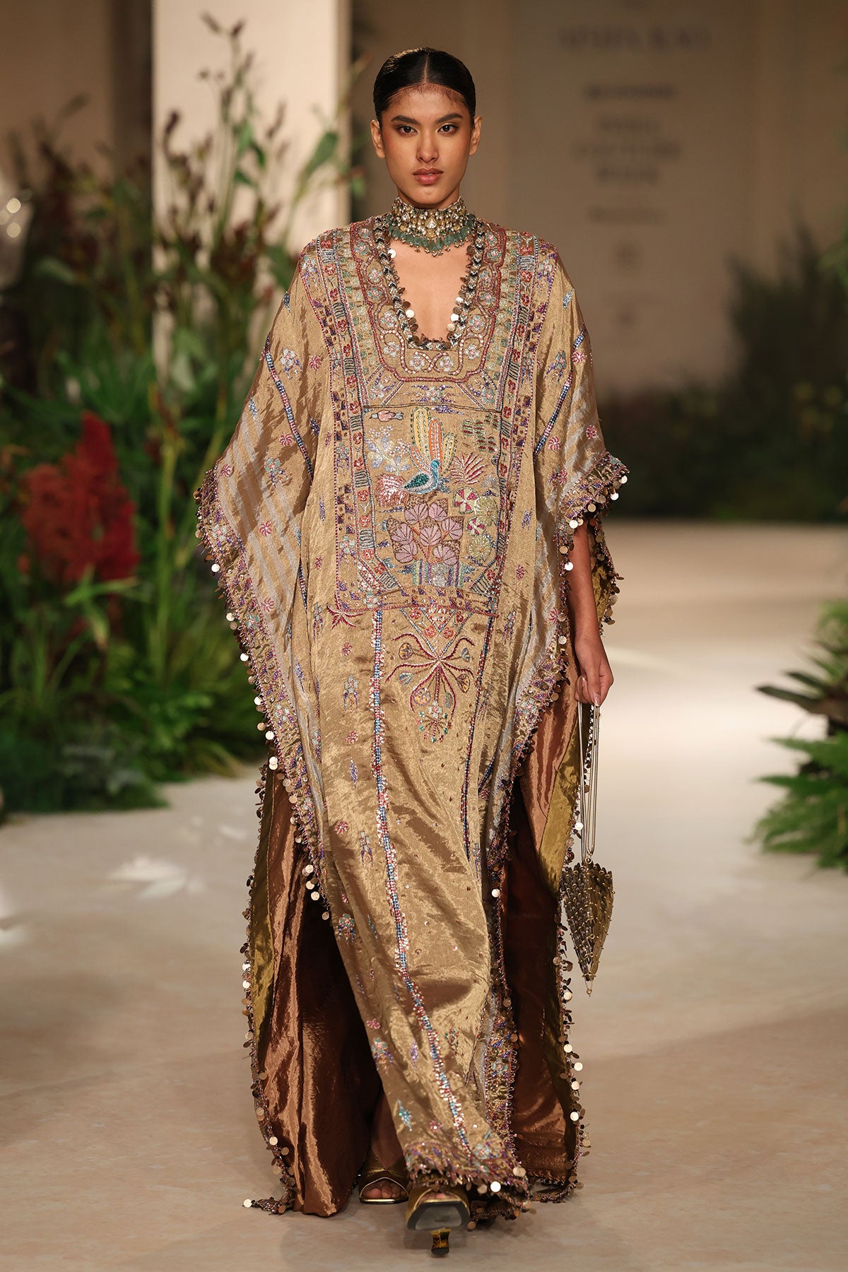 Sleeve detail from the Wild At Heart golden applique embellished kaftan showing couture finishing