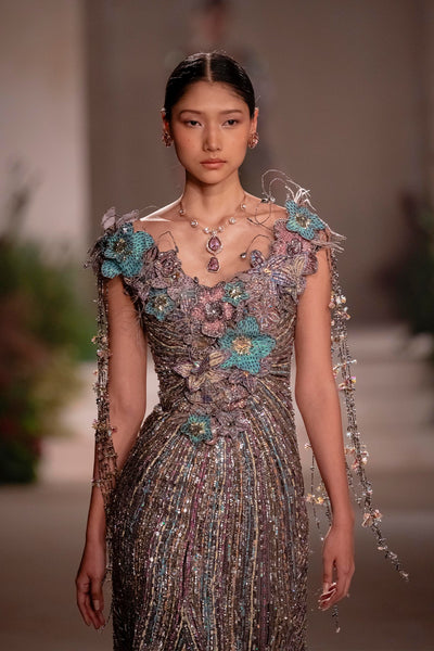 Front view of the grey organza fishtail gown showcasing beaded embellishment and delicate 3D floral appliqué