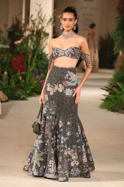 Gunmetal applique embellished tulle mermaid lehenga and blouse with beads and crystal fringes shown in a full couture view