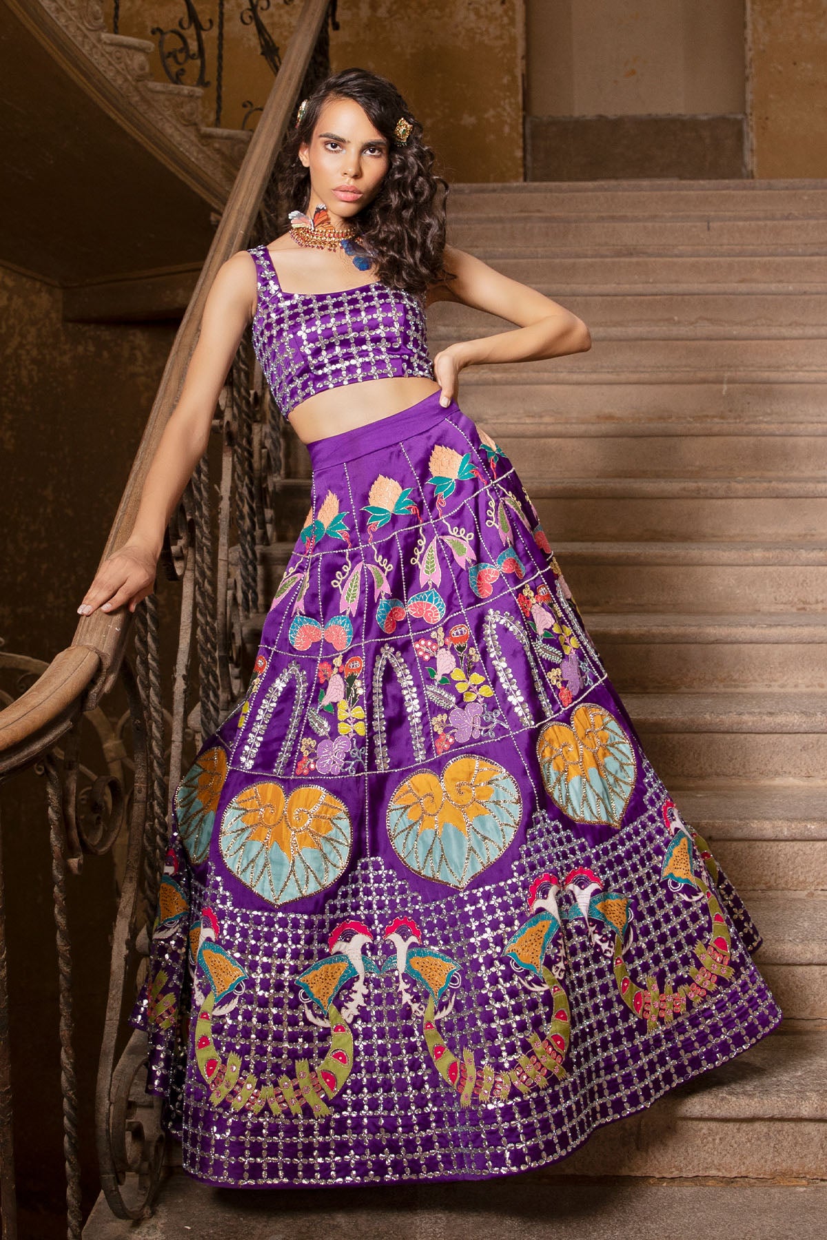 Woman in Razzamatazz purple organza lehenga