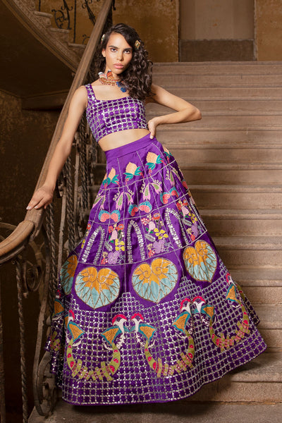 Woman in Razzamatazz purple organza lehenga