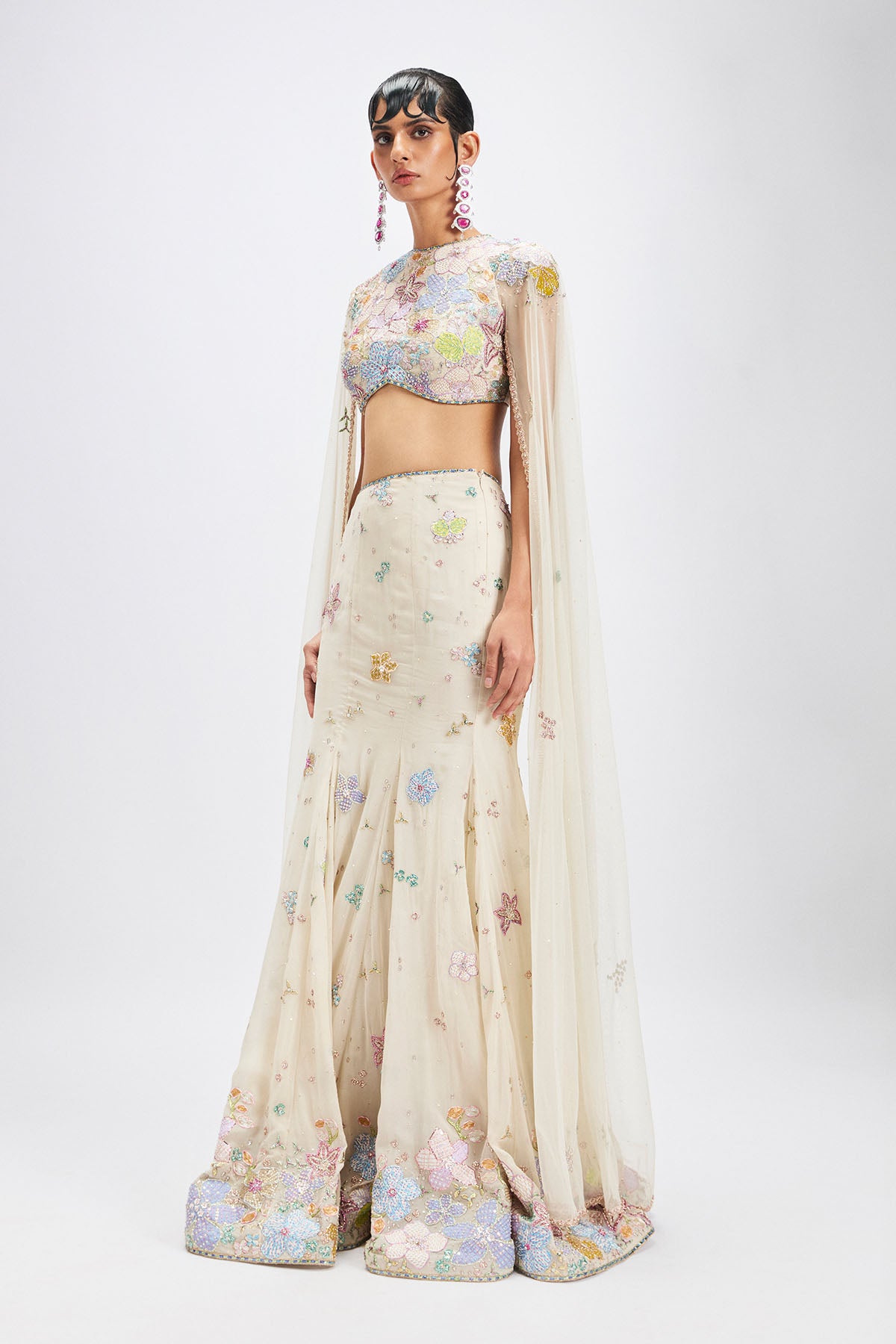 Mermaid lehenga in ivory with applique cape blouse