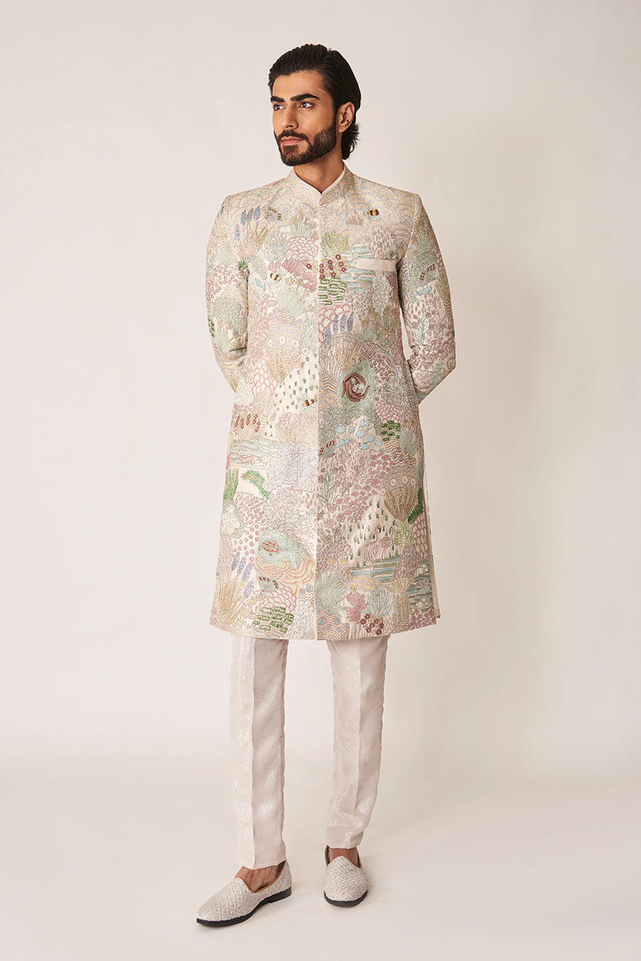 Traditional ivory sherwani with modern pants