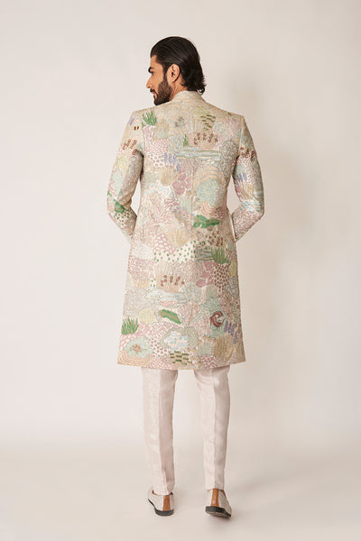 Rear silhouette of raw silk sherwani and pants