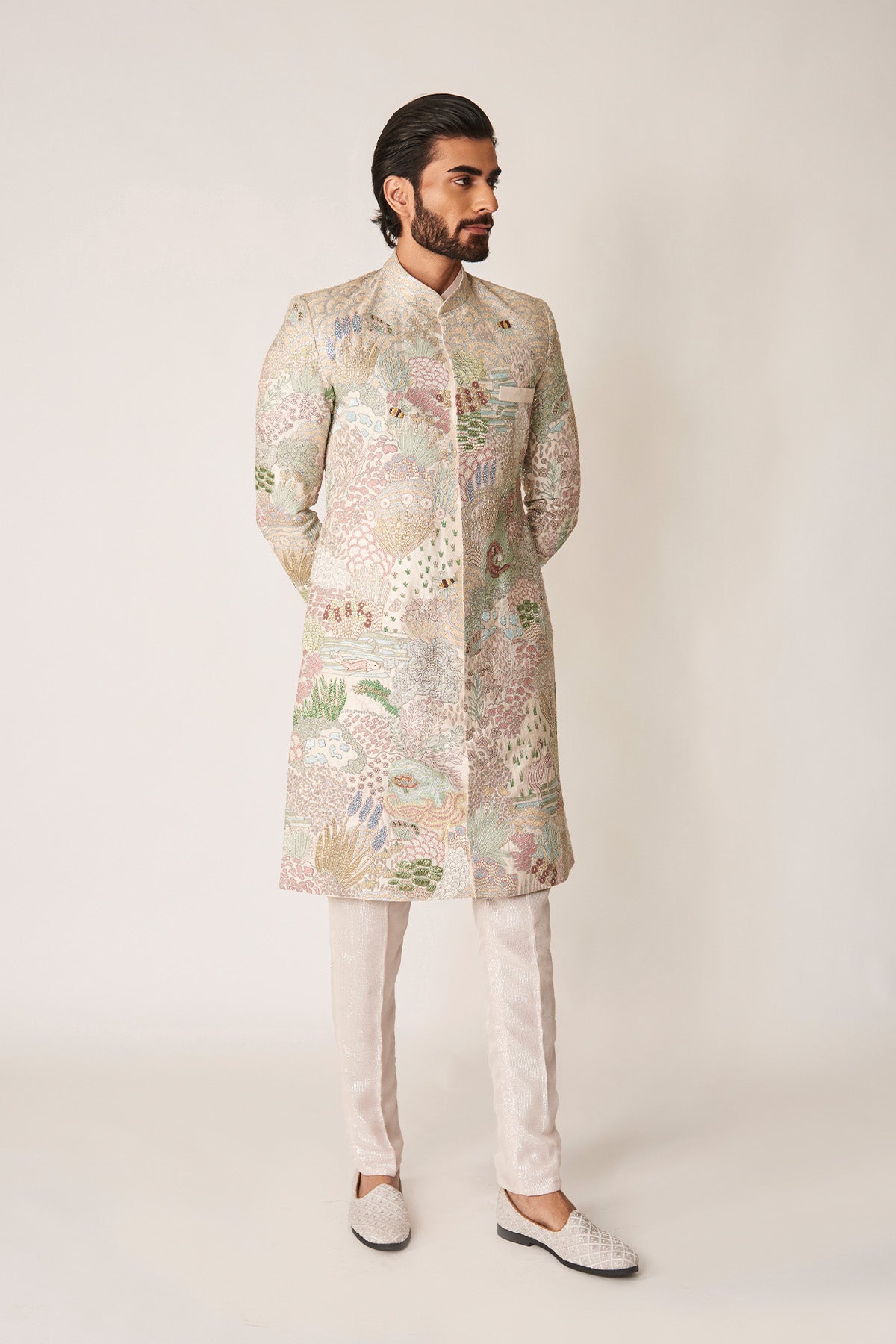 Right profile of ivory sherwani with pants