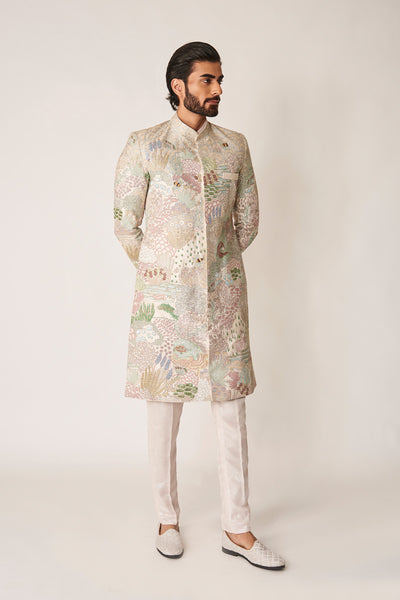 Right profile of ivory sherwani with pants