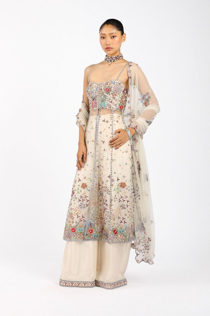 Woman in Matilda applique ivory anarkali left profile