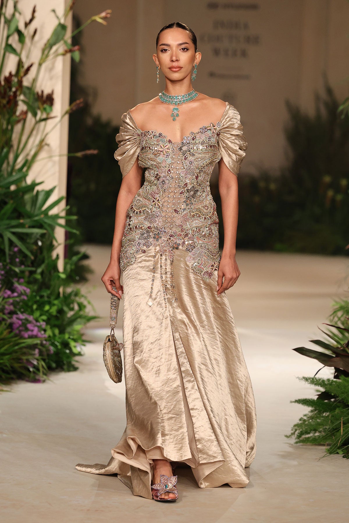 Front view of the Wild At Heart light gold embellished brocade gown highlighting the plunge neckline and applique detailing