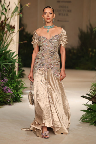 Front view of the Wild At Heart light gold embellished brocade gown highlighting the plunge neckline and applique detailing