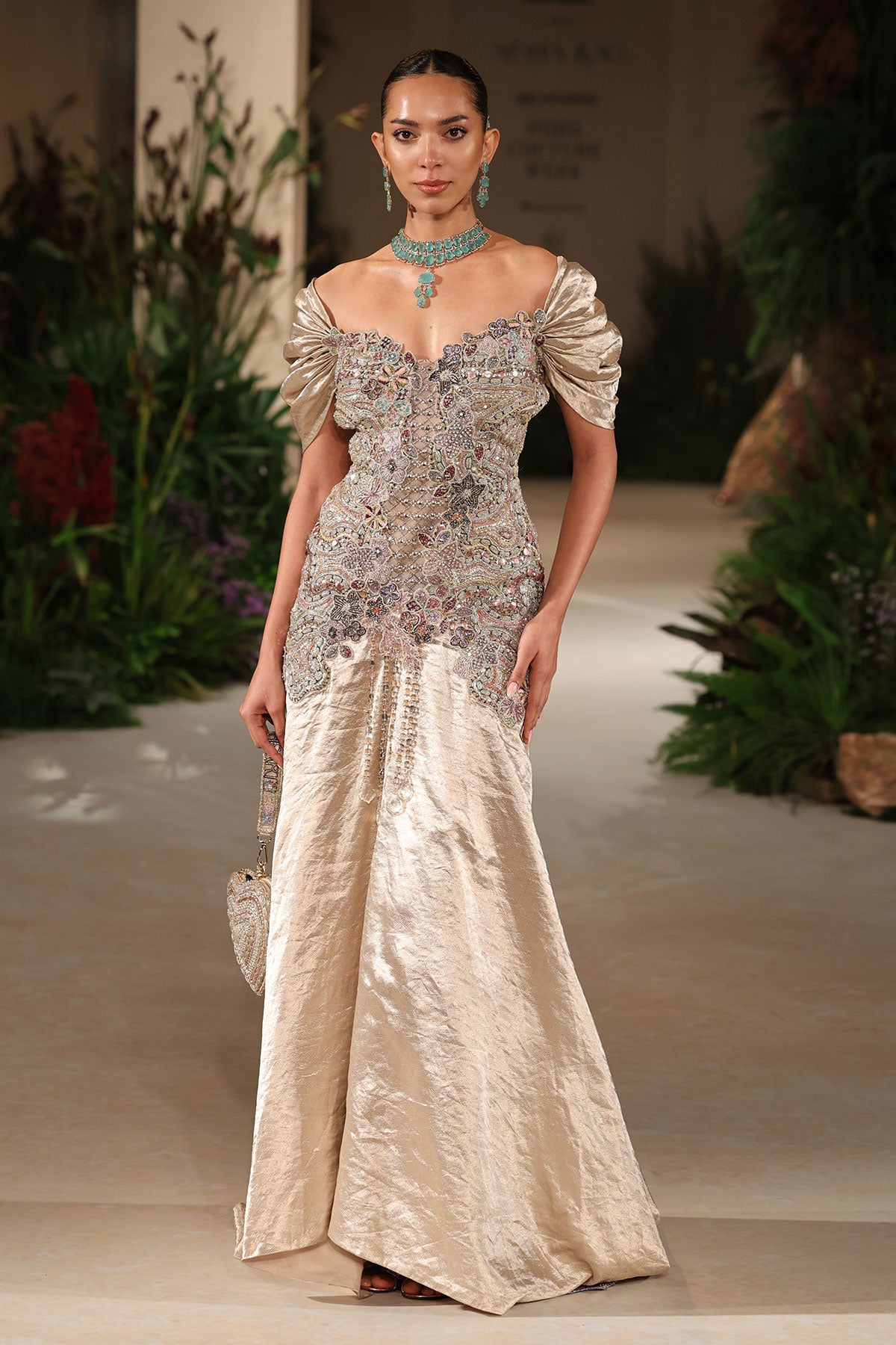 Wild At Heart light gold applique embellished banarasi tissue brocade gown with plunge neckline and puffed sleeves shown in a full couture view