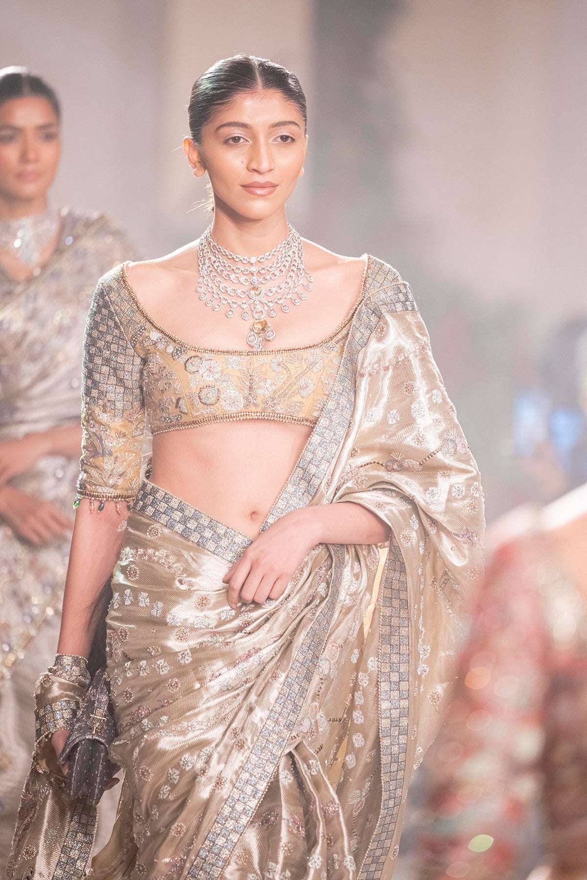 Embellished border of the Wild At Heart light gold brocade saree with intricate applique and shimmering detailing