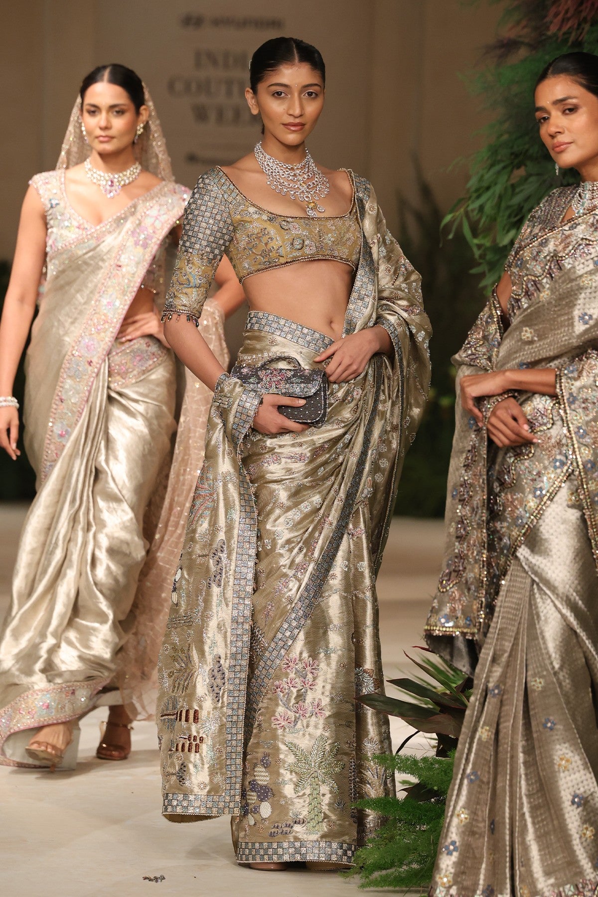 Front drape of the Wild At Heart light gold banarasi tissue brocade saree revealing applique and embellished detailing