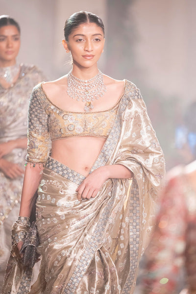 Wild At Heart light gold applique embellished banarasi tissue brocade saree with tissue blouse shown in a full couture view