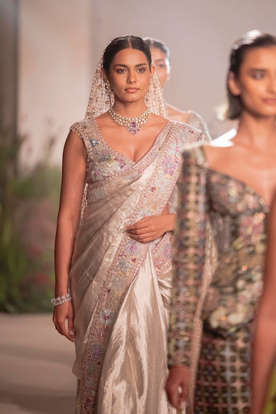 Applique detail from the Wild At Heart light gold tissue brocade saree showing intricate handcrafted motifs