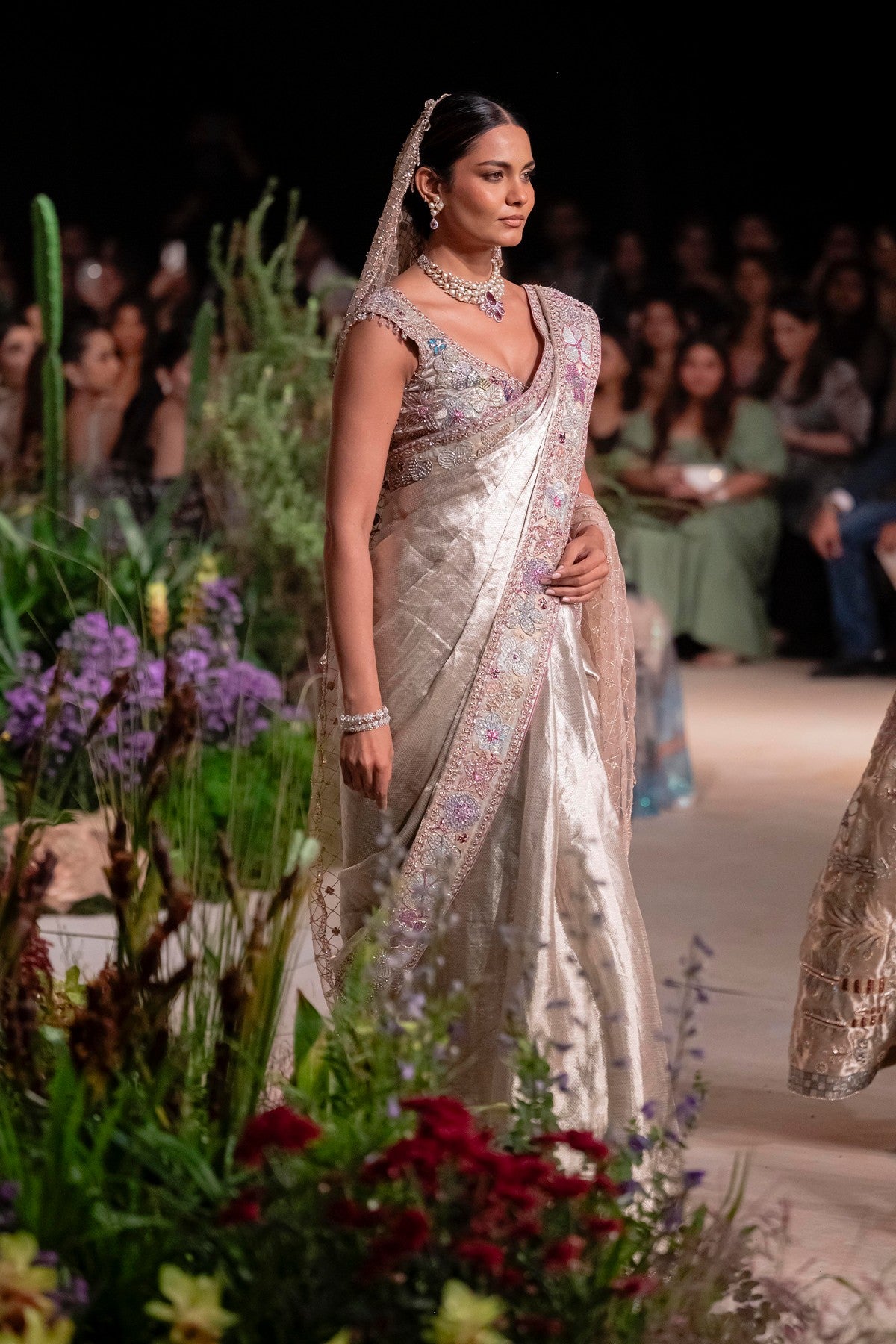 Side profile of the Wild At Heart light gold tissue brocade saree showcasing couture applique and embellished artistry
