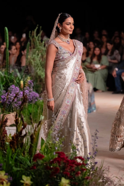Side profile of the Wild At Heart light gold tissue brocade saree showcasing couture applique and embellished artistry